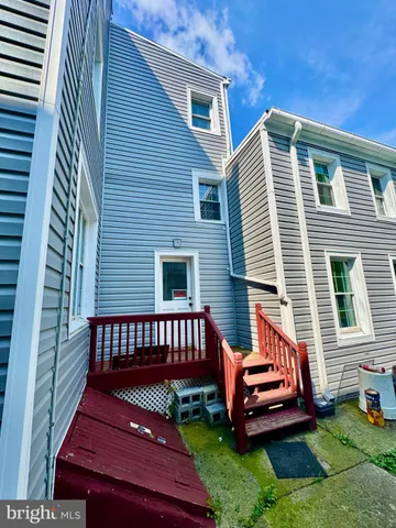 a backyard of a house with seating space