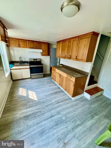 a workspace with furniture and window