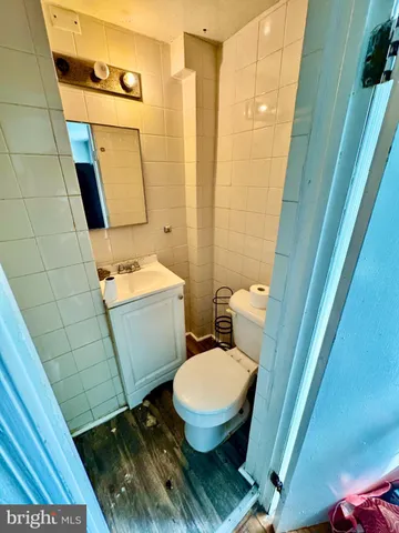 a bathroom with a sink and toilet