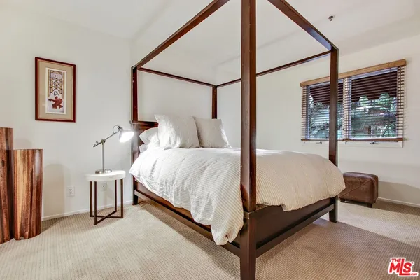 a bathroom with a bathtub and a sink