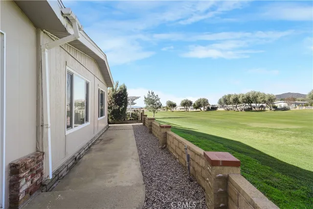 a view of a lake with a big yard
