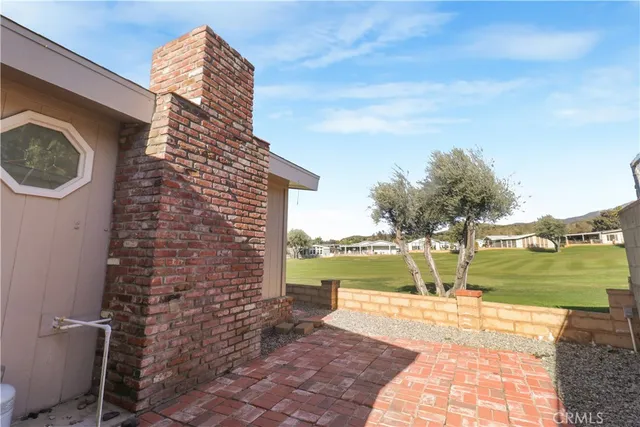 a view of a yard with an ocean view