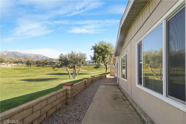 a view of swimming pool with an ocean view