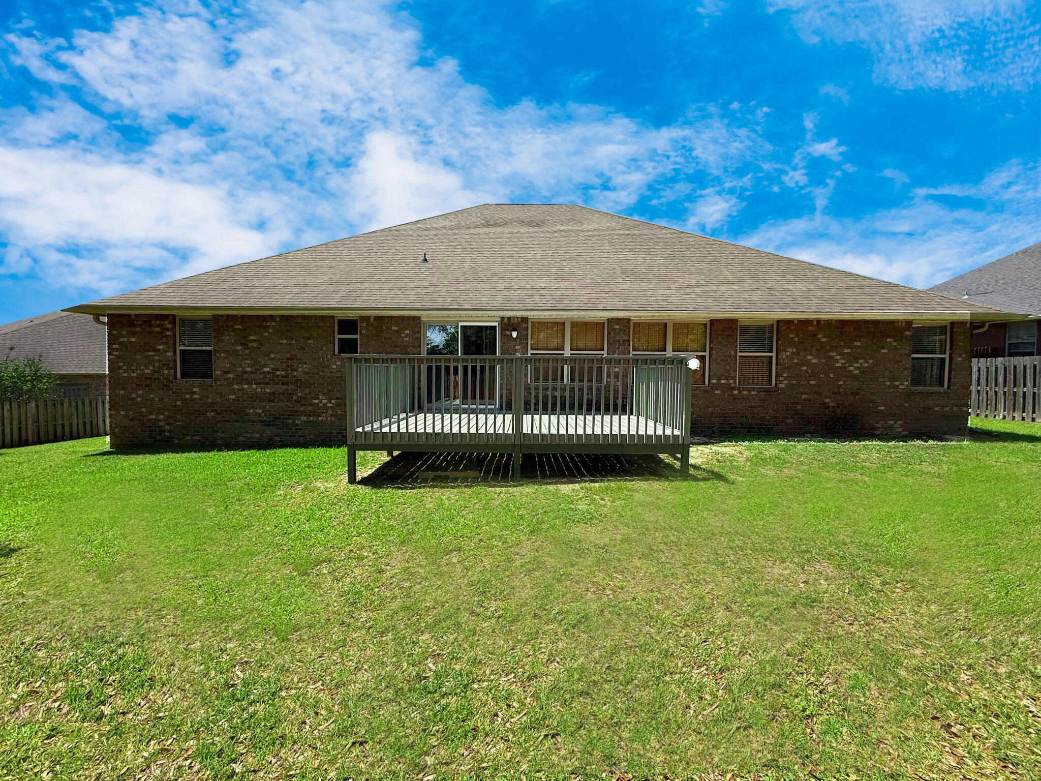 505 Vale Loop Crestview, FL 32536 - Photo 3 of 14 a front view of house with a garden