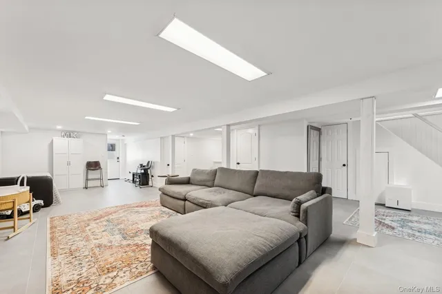 a living room with furniture and a couch