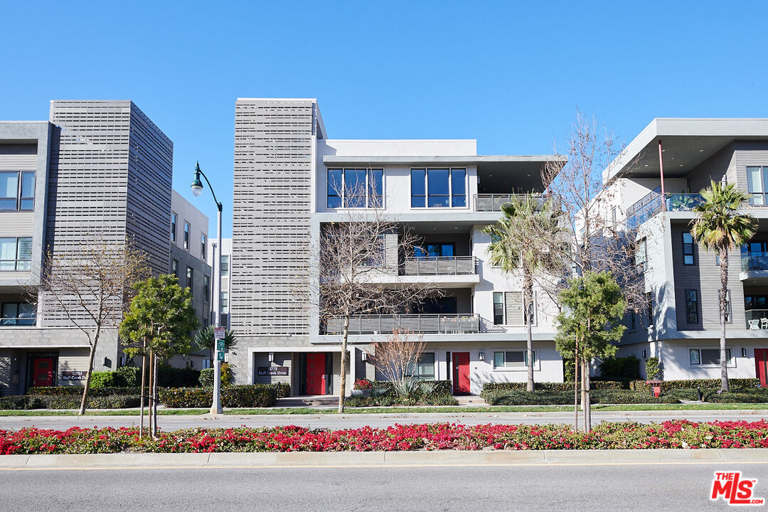 12775 Bluff Creek Drive, Unit 1 Los Angeles, CA 90094 - Photo 1 of 1 a front view of a building with street