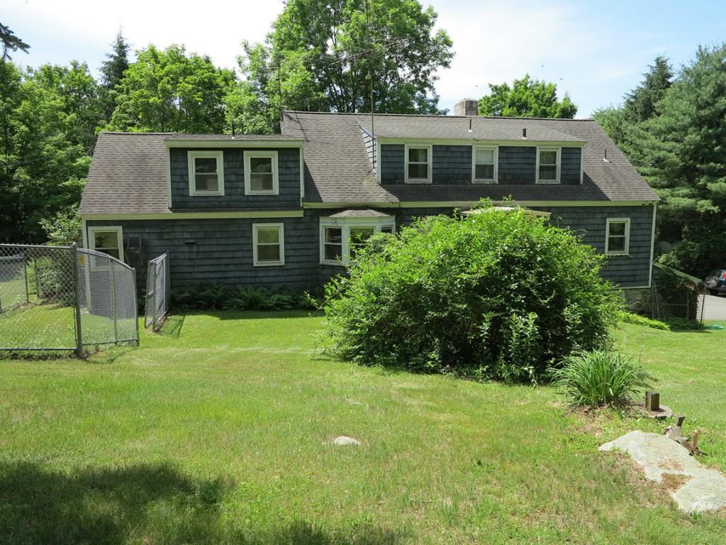 52 Cemetery Hill Road Cornwall, CT 06796 - Photo 1 of 1 a front view of a house with a yard