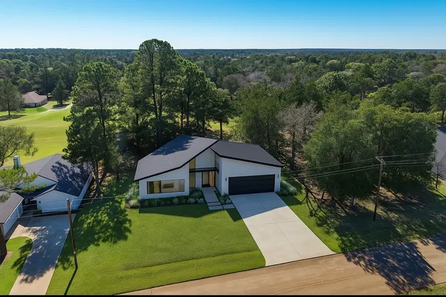 a house view with a outdoor space
