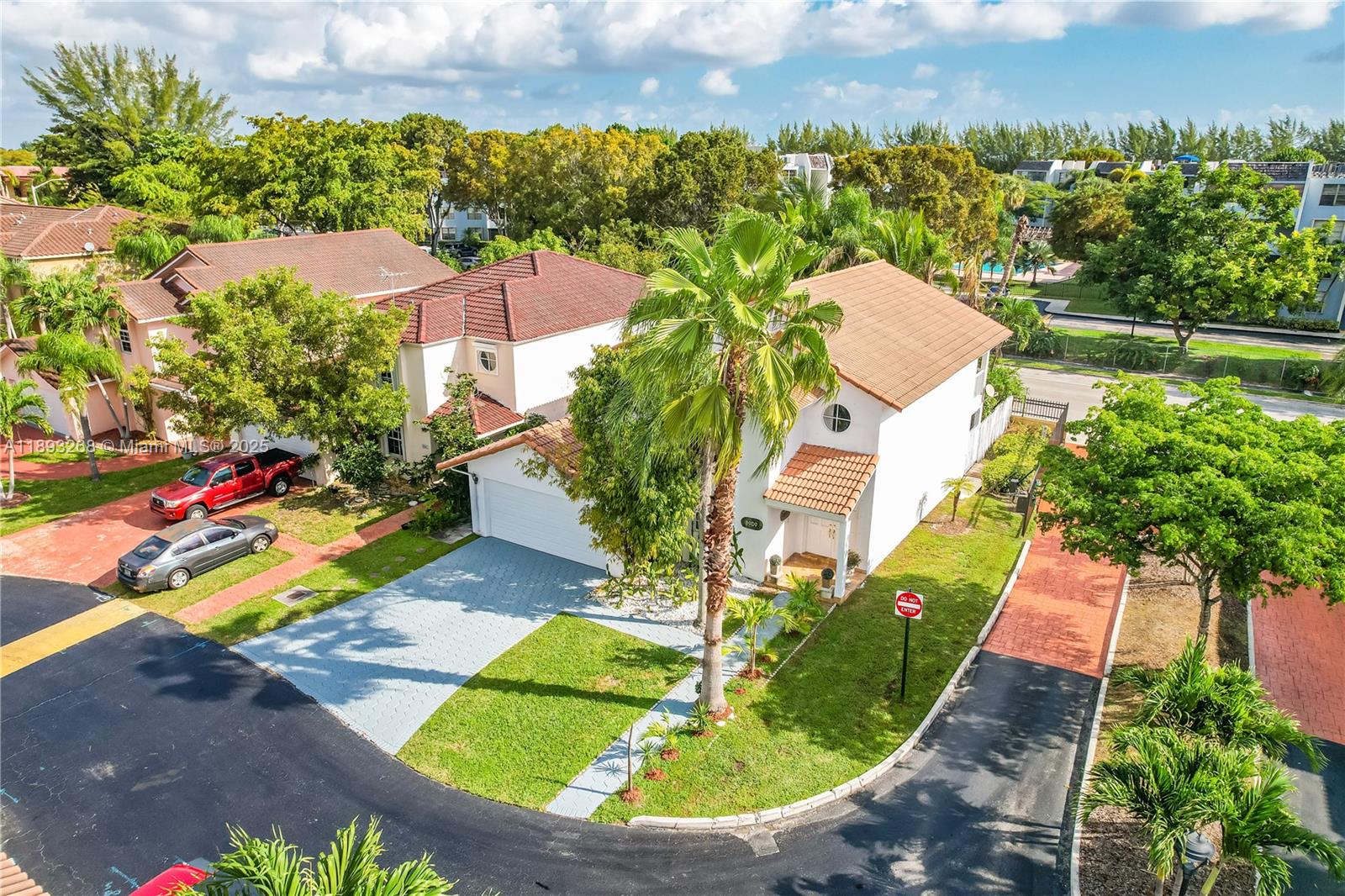 8909 Southwest 108th Circle Miami, FL 33176 - Photo 1 of 28 an aerial view of residential houses with outdoor space