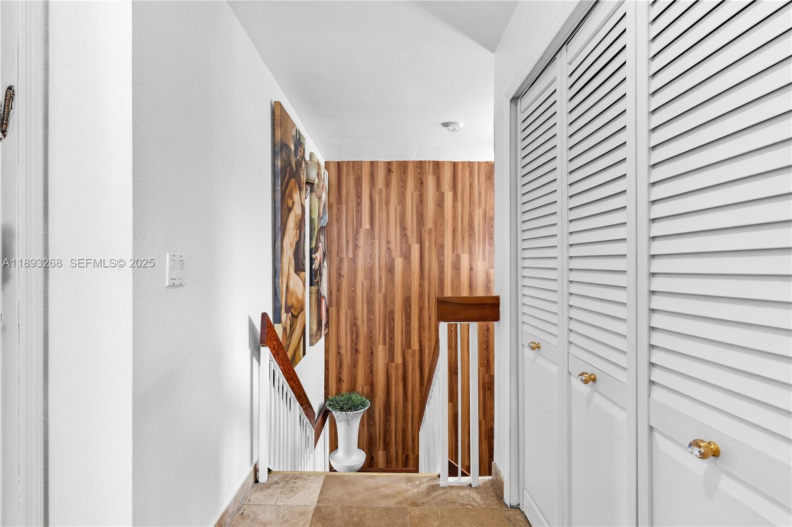 8909 Southwest 108th Circle Miami, FL 33176 - Photo 19 of 28 a view of a hallway with staircase
