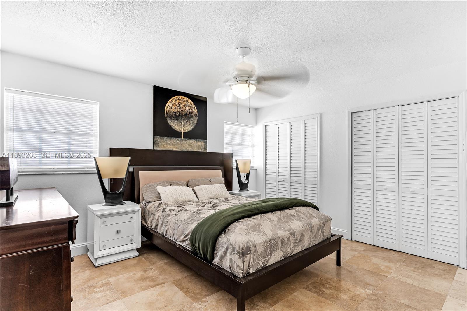 8909 Southwest 108th Circle Miami, FL 33176 - Photo 21 of 28 a bedroom with a bed and a window