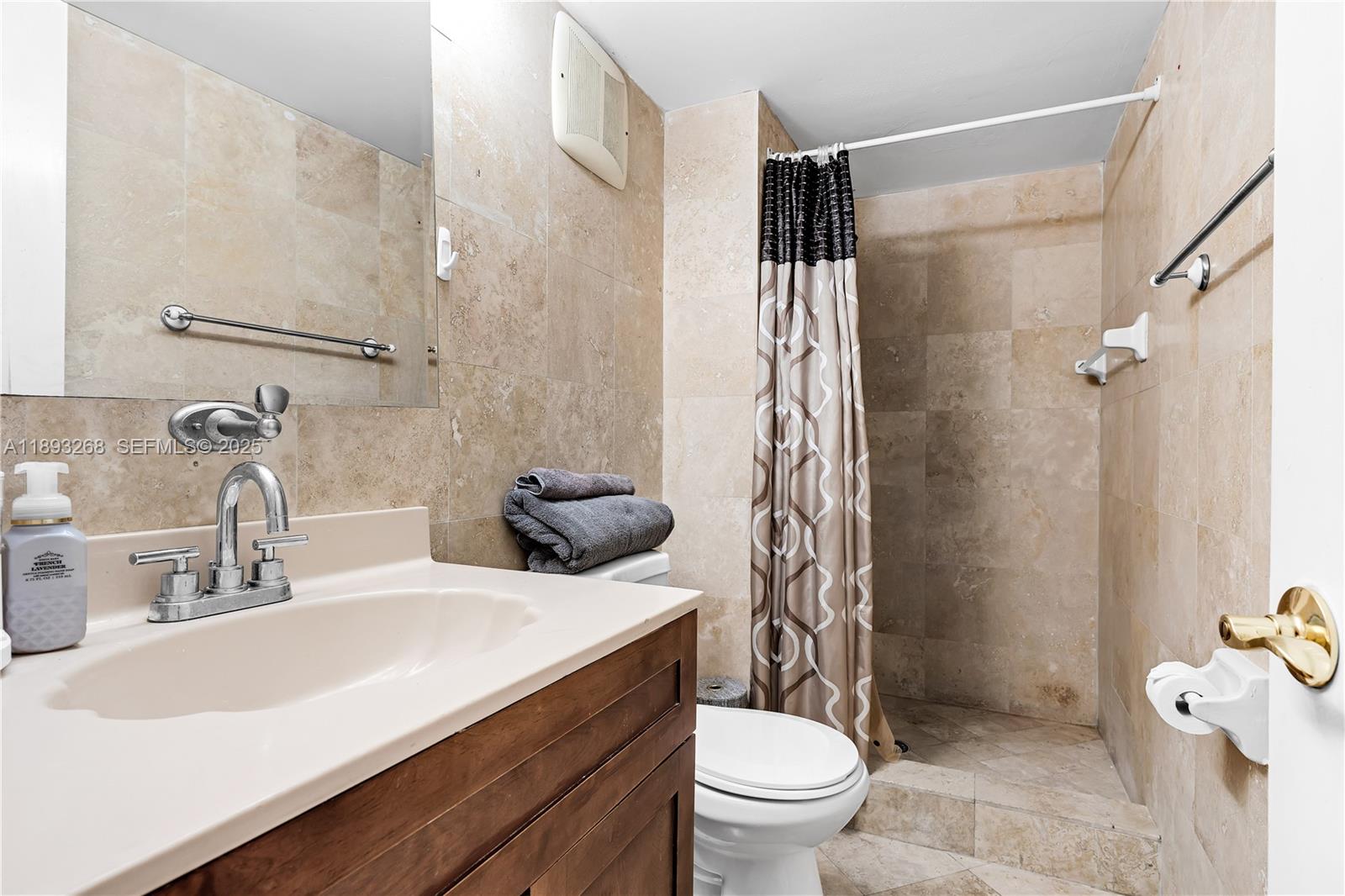 8909 Southwest 108th Circle Miami, FL 33176 - Photo 22 of 28 a bathroom with a sink toilet and shower