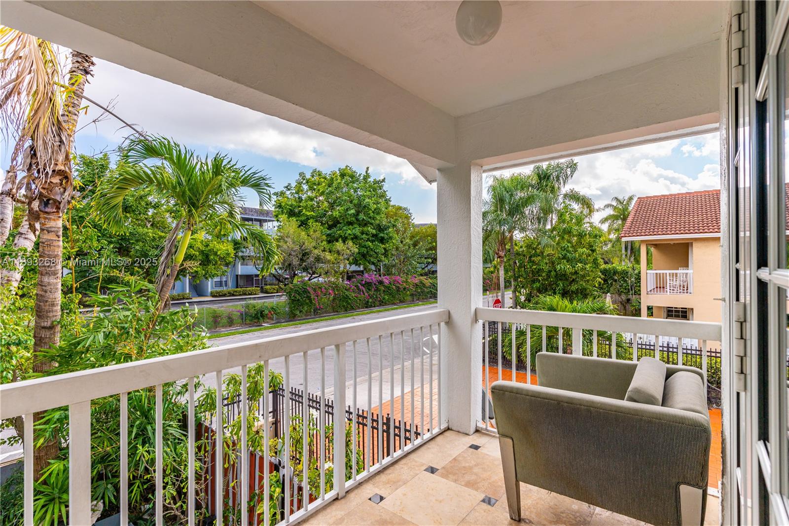 8909 Southwest 108th Circle Miami, FL 33176 - Photo 23 of 28 a view of a two chair in the balcony