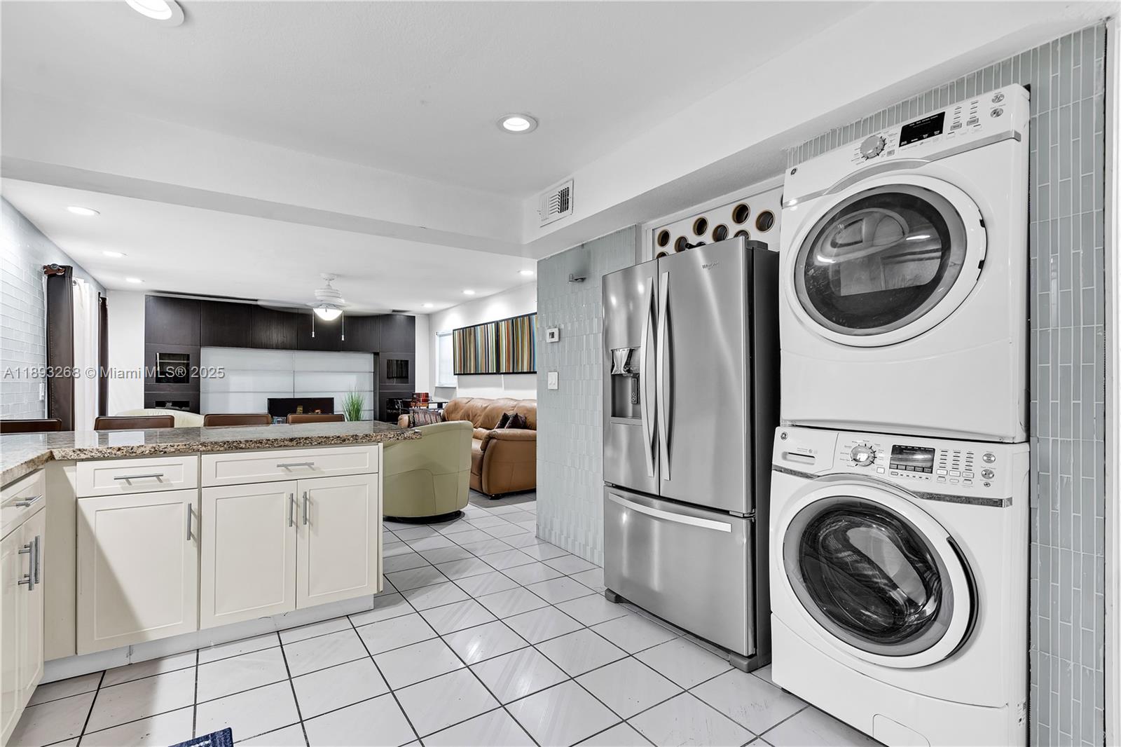 8909 Southwest 108th Circle Miami, FL 33176 - Photo 26 of 28 a kitchen with cabinets and stainless steel appliances