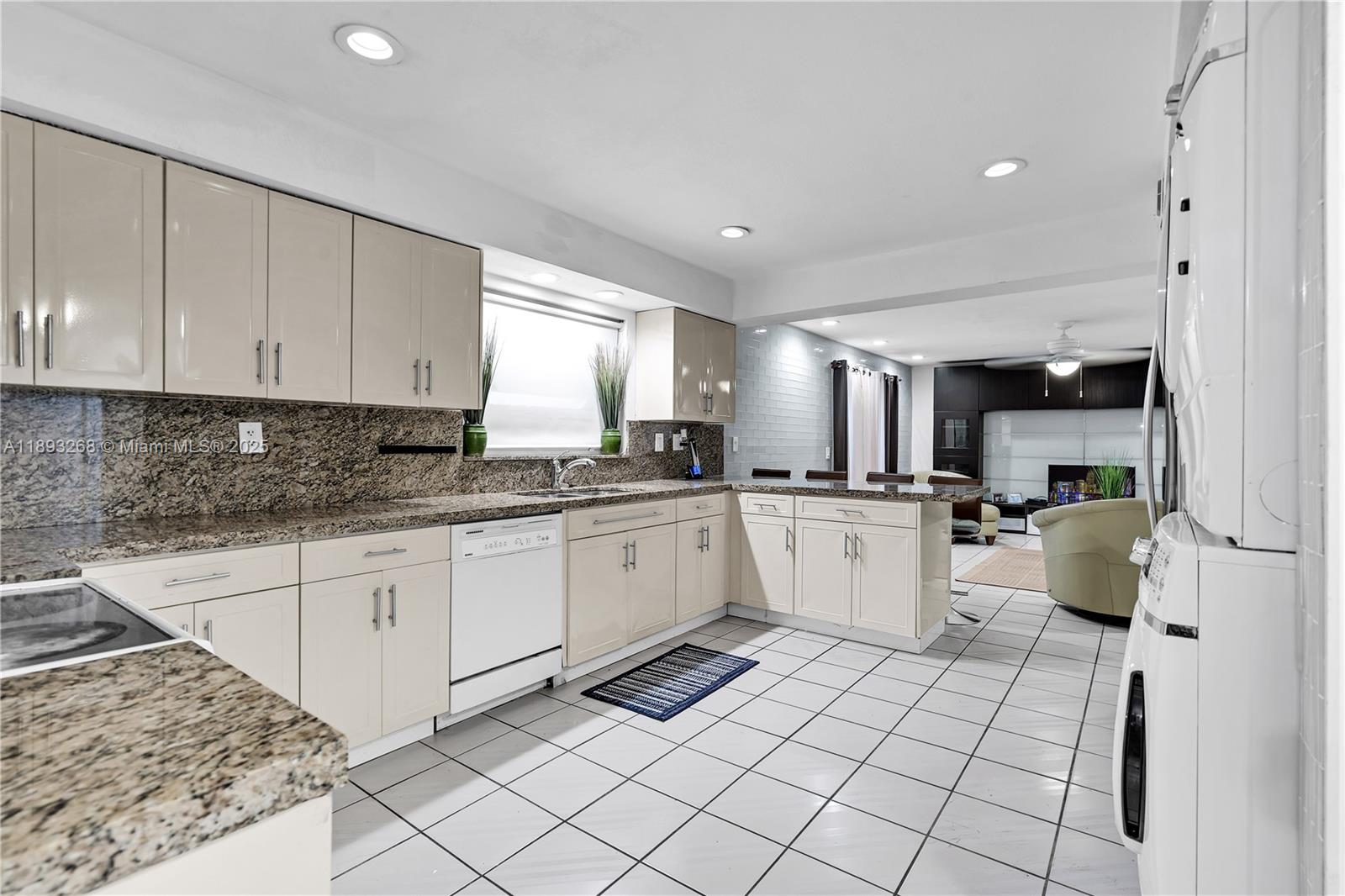 8909 Southwest 108th Circle Miami, FL 33176 - Photo 7 of 28 a kitchen with cabinets and window
