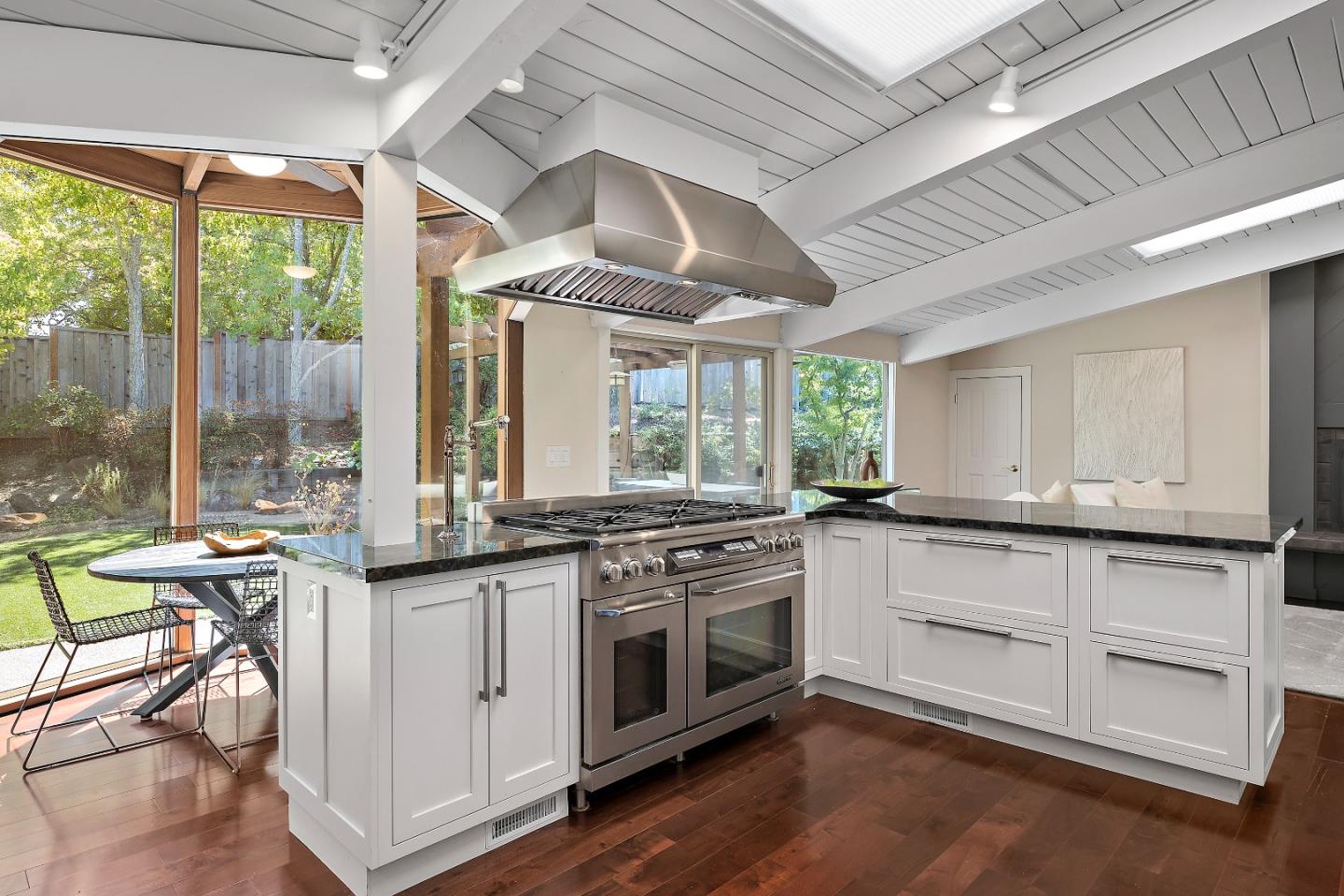 60 Linaria Way Portola Valley, CA 94028 - Photo 11 of 39 a open kitchen with stainless steel appliances granite countertop a stove and white cabinets