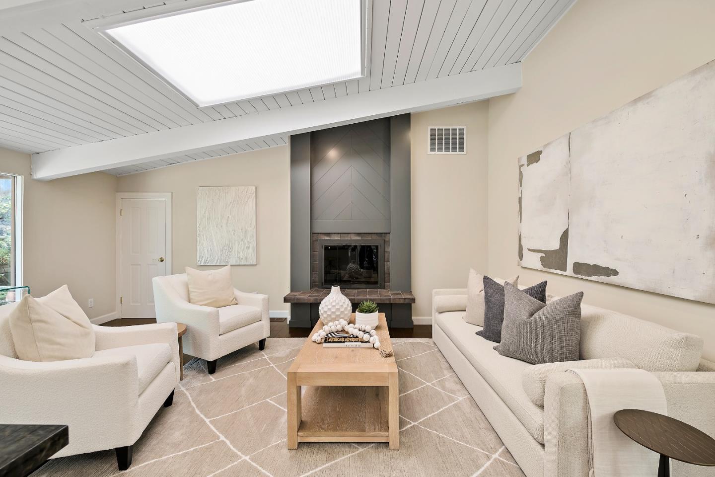 60 Linaria Way Portola Valley, CA 94028 - Photo 15 of 39 a living room with furniture and a fireplace