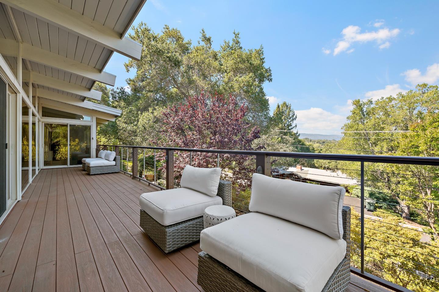 60 Linaria Way Portola Valley, CA 94028 - Photo 17 of 39 a balcony with wooden floor and outdoor seating