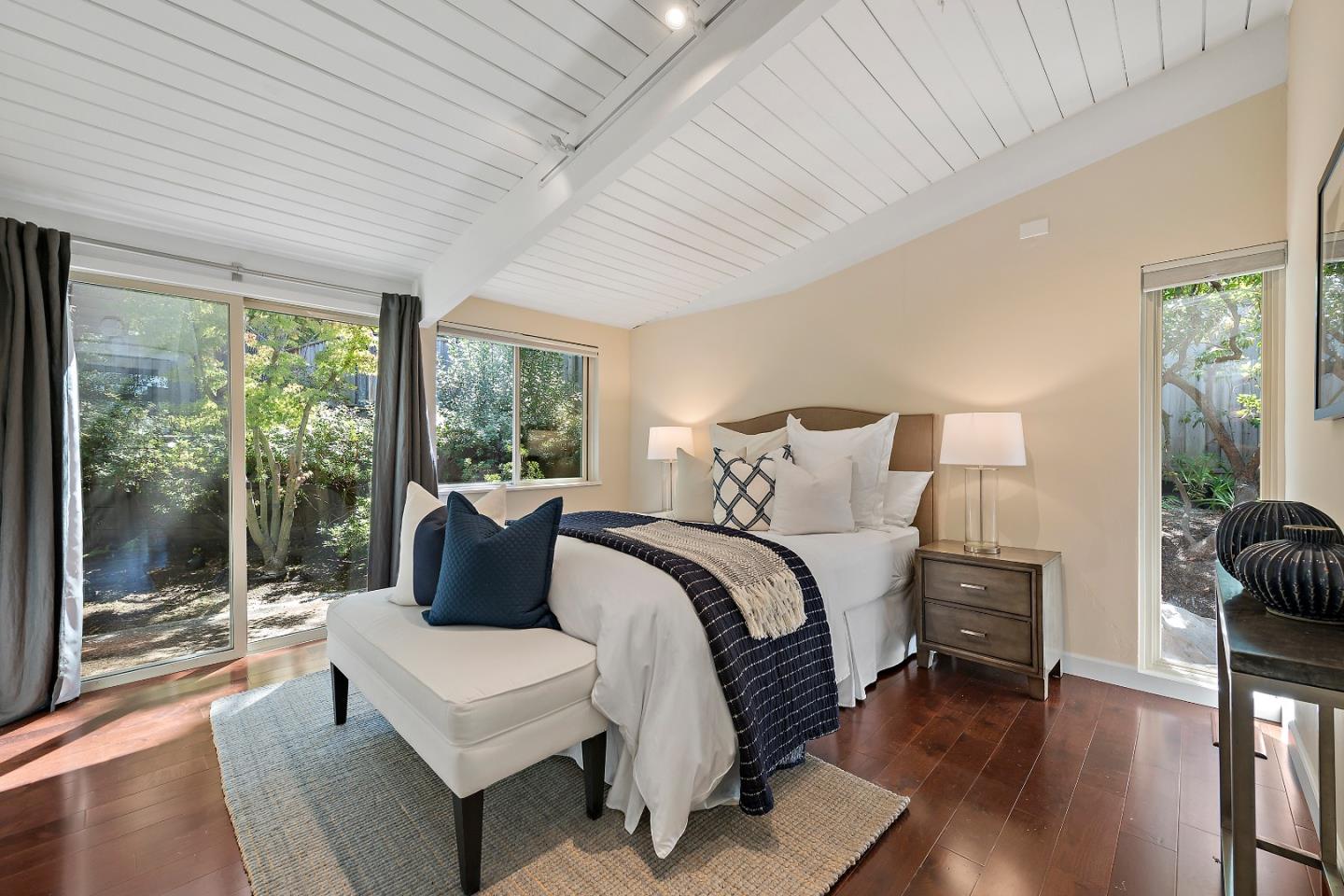 60 Linaria Way Portola Valley, CA 94028 - Photo 21 of 39 a bedroom with a bed and a large window