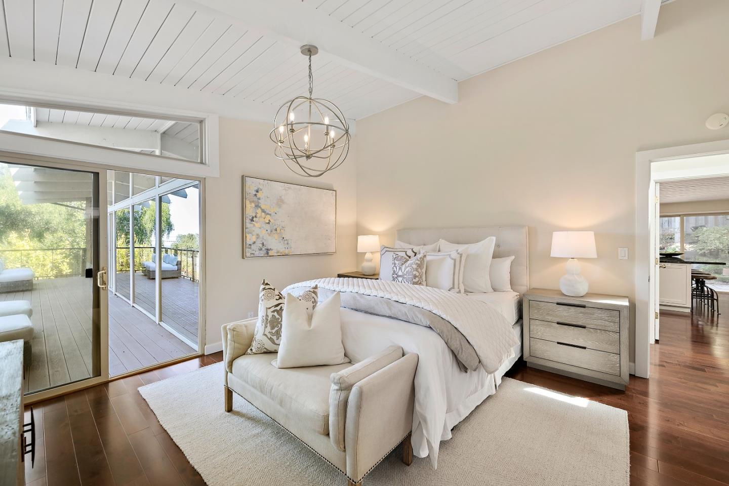 60 Linaria Way Portola Valley, CA 94028 - Photo 22 of 39 a spacious bedroom with a bed and a large window