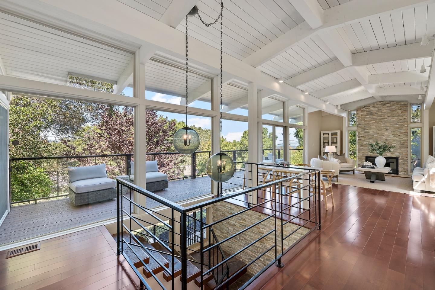 60 Linaria Way Portola Valley, CA 94028 - Photo 5 of 39 a living room with furniture a flat screen tv and windows
