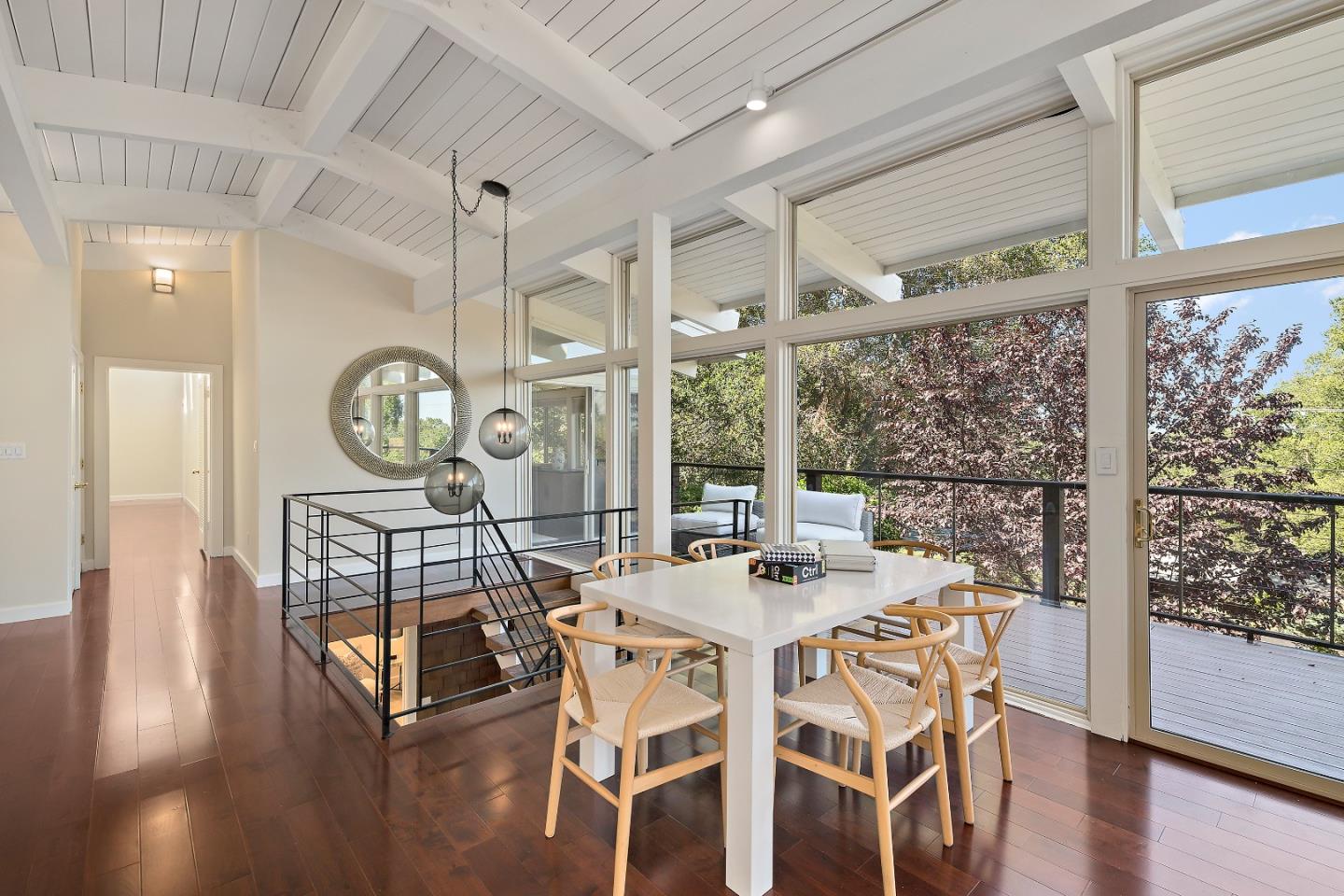 60 Linaria Way Portola Valley, CA 94028 - Photo 8 of 39 a view of a dining room with furniture window and wooden floor