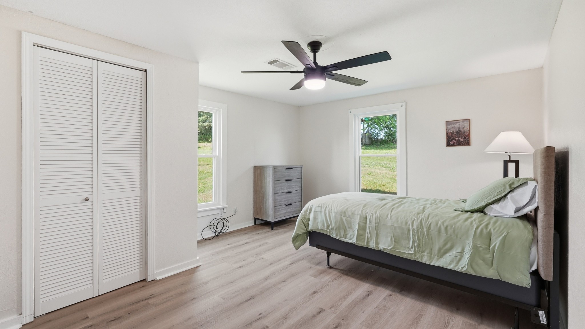 469 Fred Cooper Road McMinnville, TN 37110 - Photo 25 of 46 a bedroom with a bed and a window