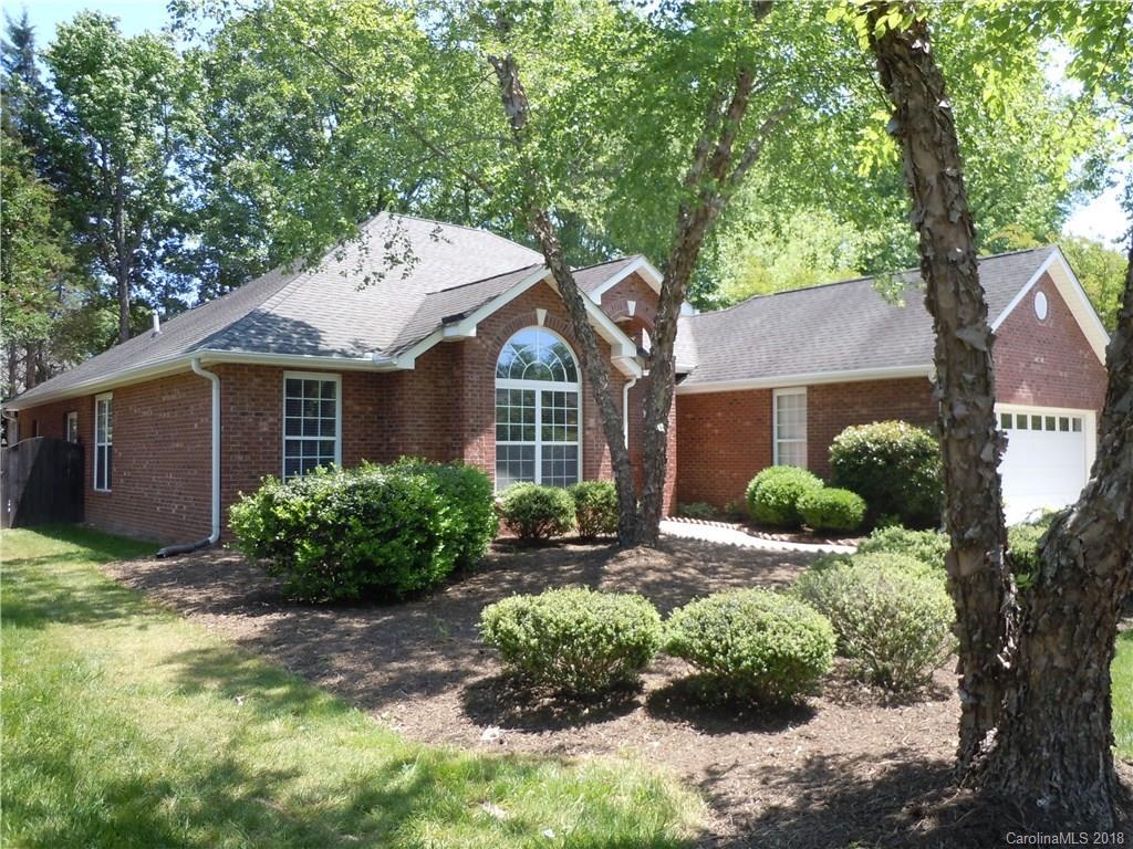 124 Zimmerman Drive Fort Mill, SC 29708 - Photo 2 of 35 a front view of a house with a yard and potted plants