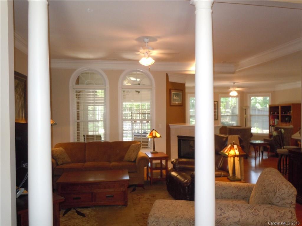 124 Zimmerman Drive Fort Mill, SC 29708 - Photo 11 of 35 a living room with furniture and a fireplace