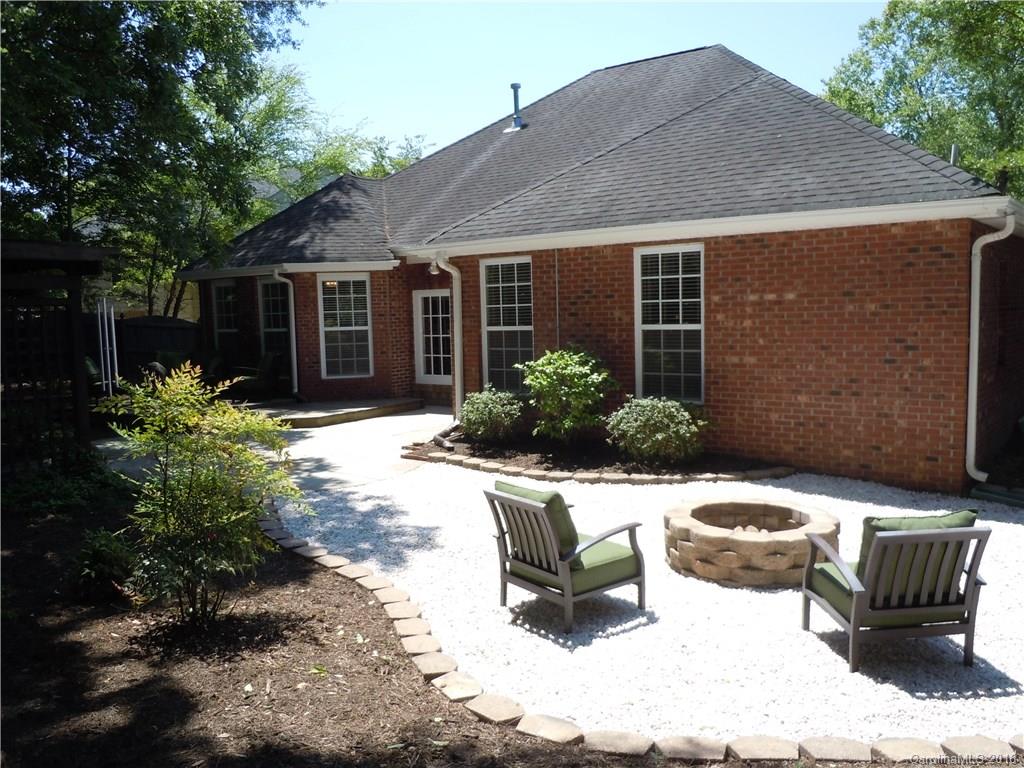 124 Zimmerman Drive Fort Mill, SC 29708 - Photo 32 of 35 a view of a house with backyard and sitting area