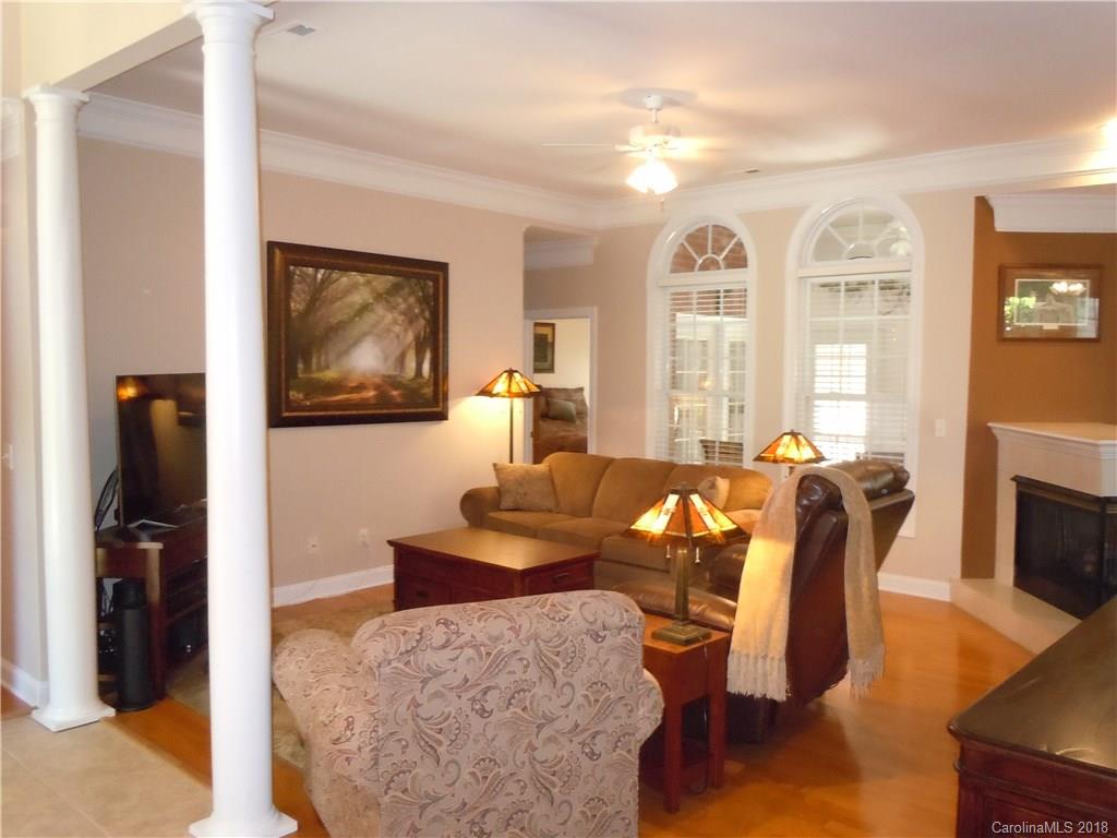 124 Zimmerman Drive Fort Mill, SC 29708 - Photo 10 of 35 a living room with furniture wooden floor and a flat screen tv