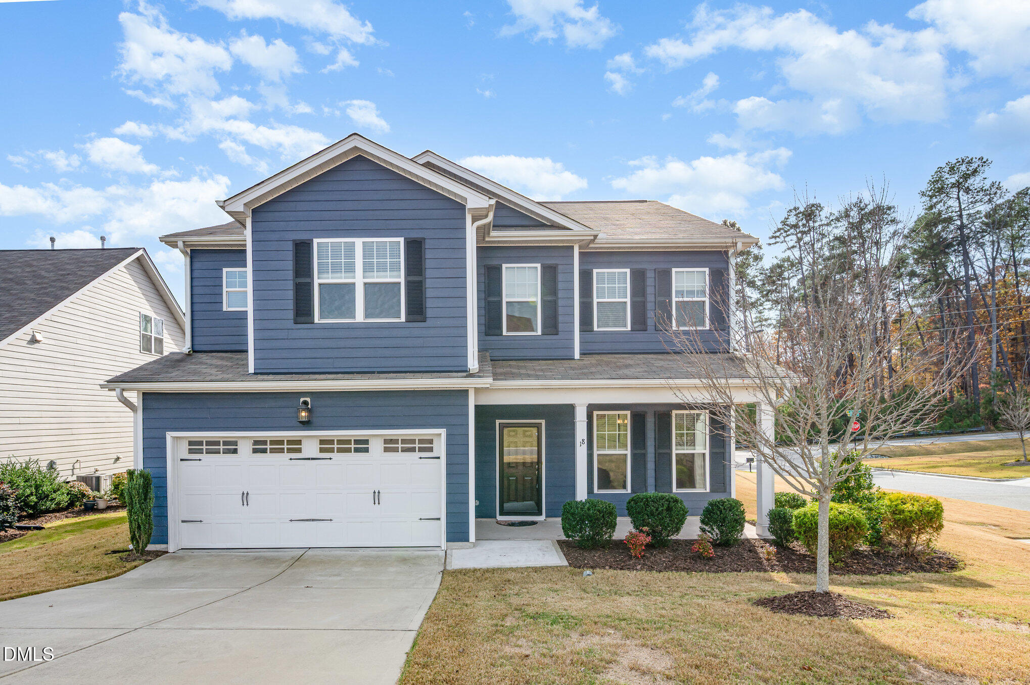 18 Dover Ridge Court Chapel Hill, NC 27517 - Photo 3 of 40 a front view of a house with a yard