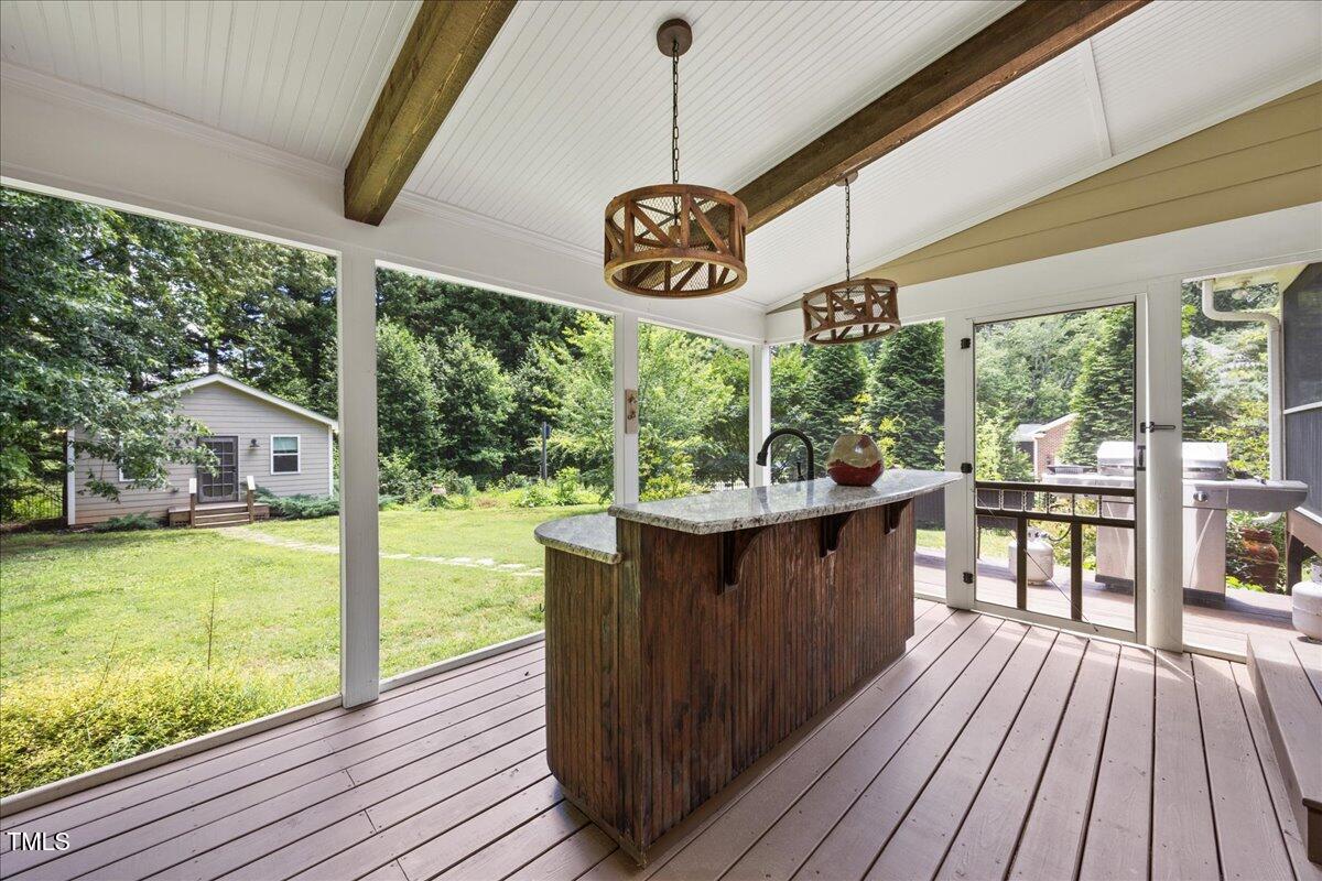 12636 Old Creedmoor Road Raleigh, NC 27613 - Photo 33 of 45 a view of a chairs and tables in the balcony