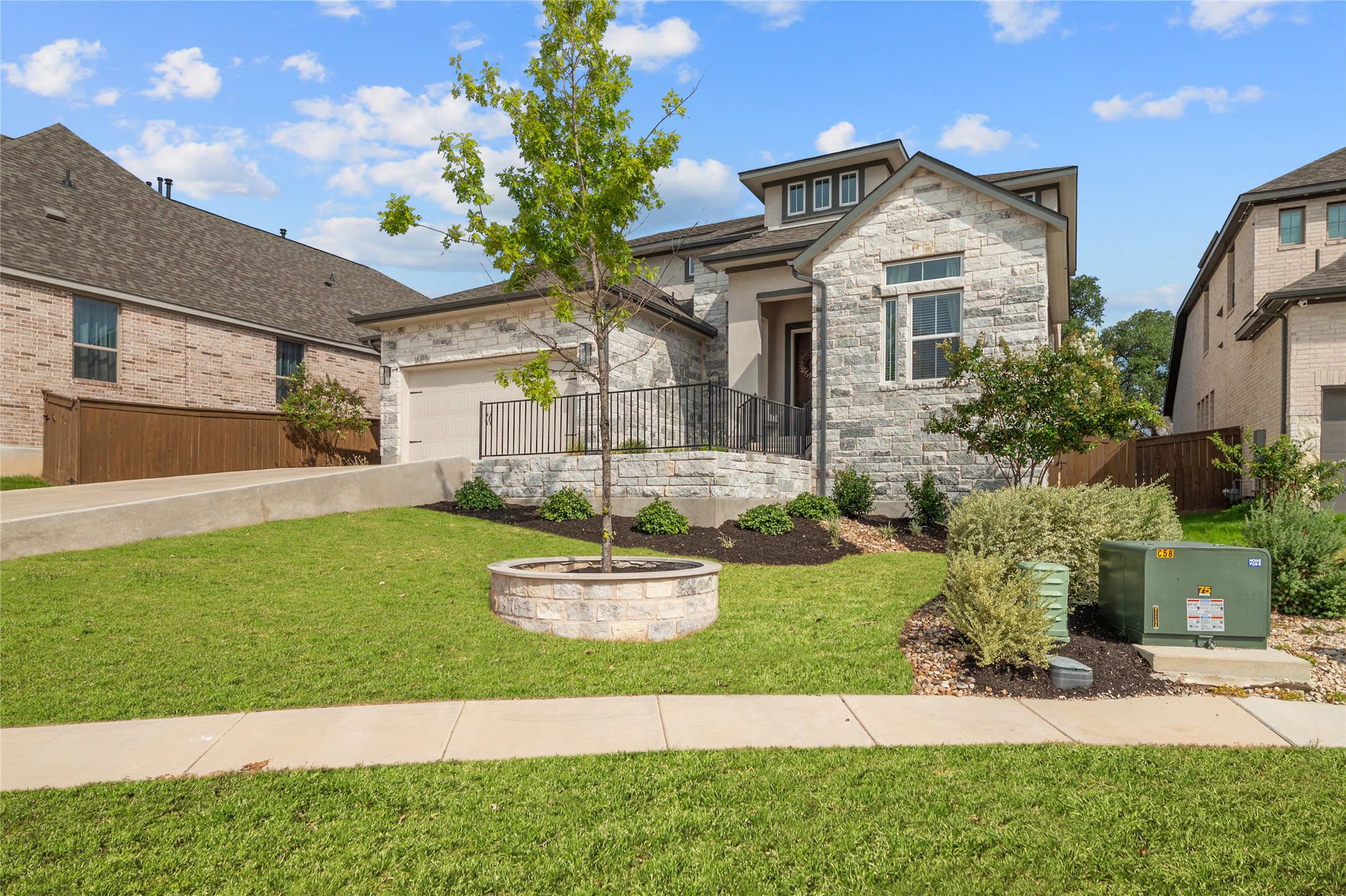 933 Donna Roland Court Leander, TX 78641 - Photo 3 of 40 a front view of a house with a yard