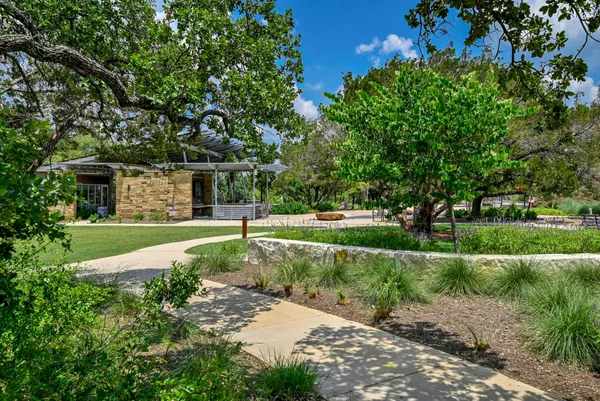 a view of a garden with an trees