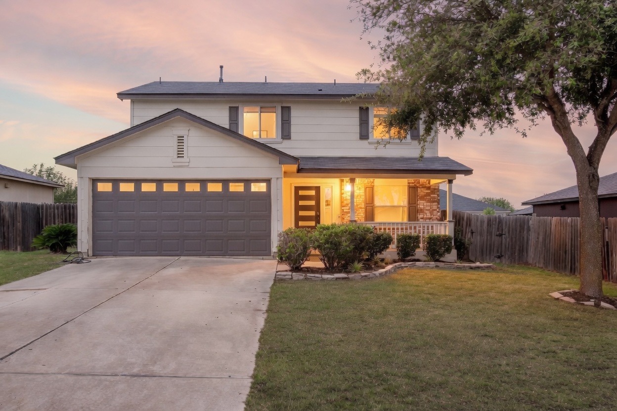 270 Endeavour Kyle, TX 78640 - Photo 1 of 20 A welcoming front porch and attached garage define this charming suburban residence.