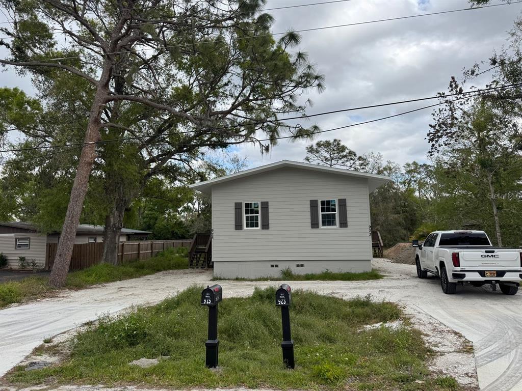 925 Hagle Park Road Bradenton, FL 34212 - Photo 1 of 1 a house view with a garden space