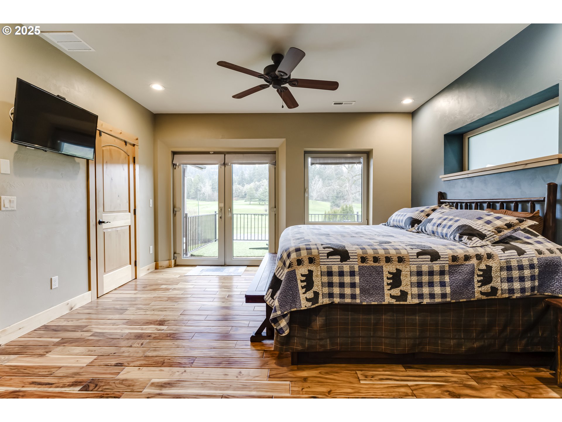2735 Emerald Street Eugene, OR 97403 - Photo 12 of 47 a bed sitting in a bedroom next to a window