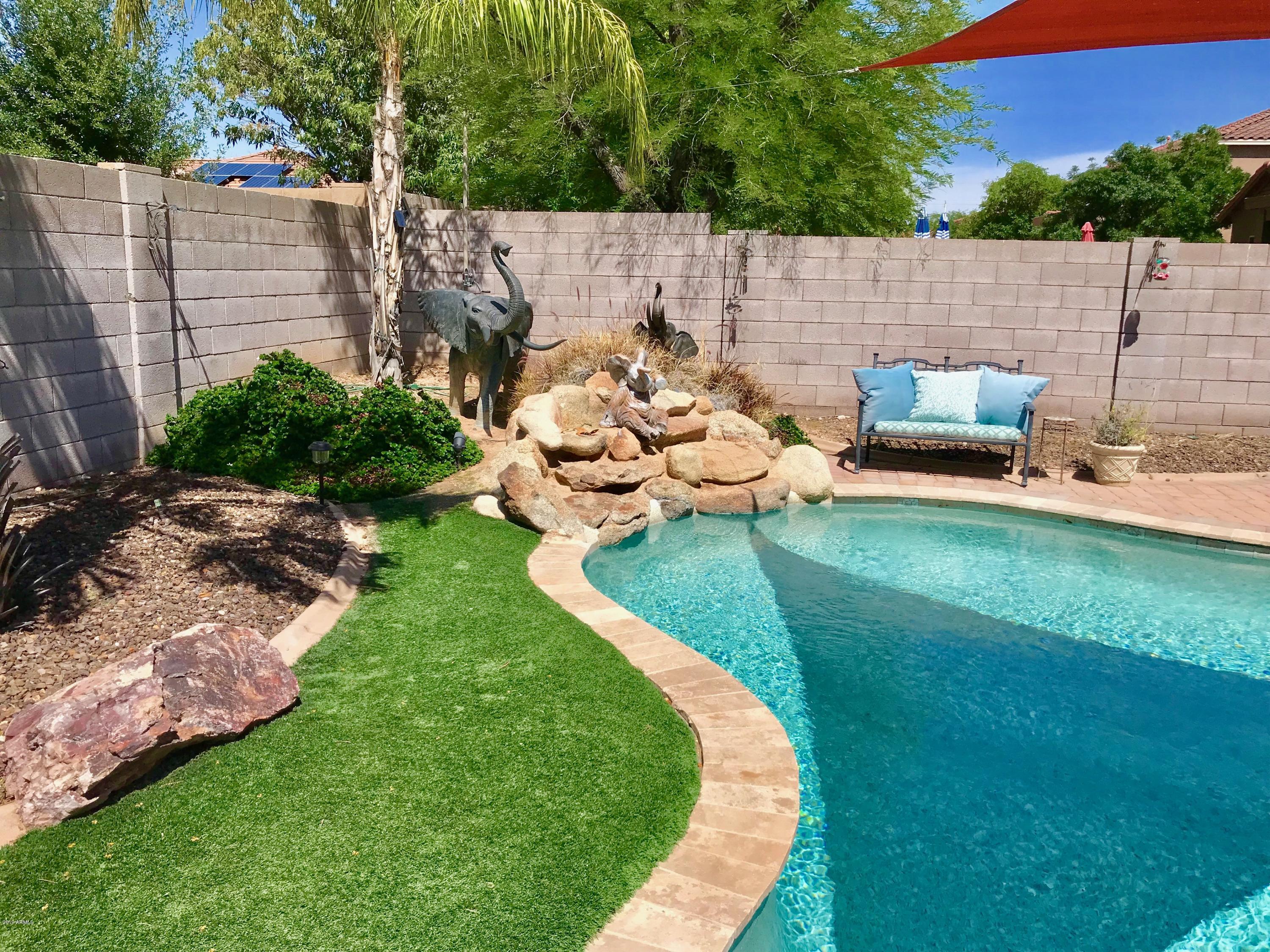 3136 West Redbird Road Phoenix, AZ 85083 - Photo 11 of 47 Pool waterfall