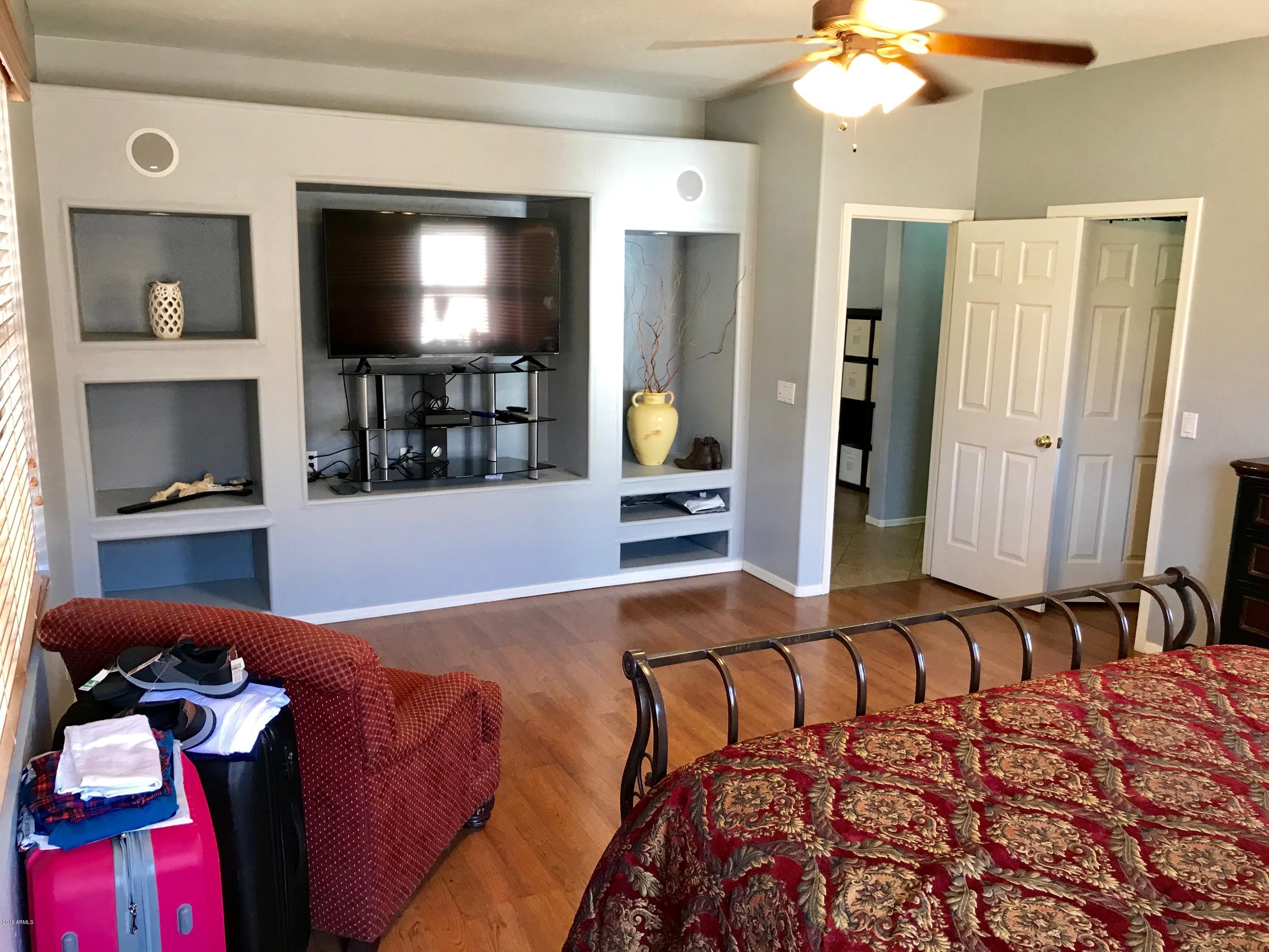 3136 West Redbird Road Phoenix, AZ 85083 - Photo 31 of 47 Master BR built in shelving