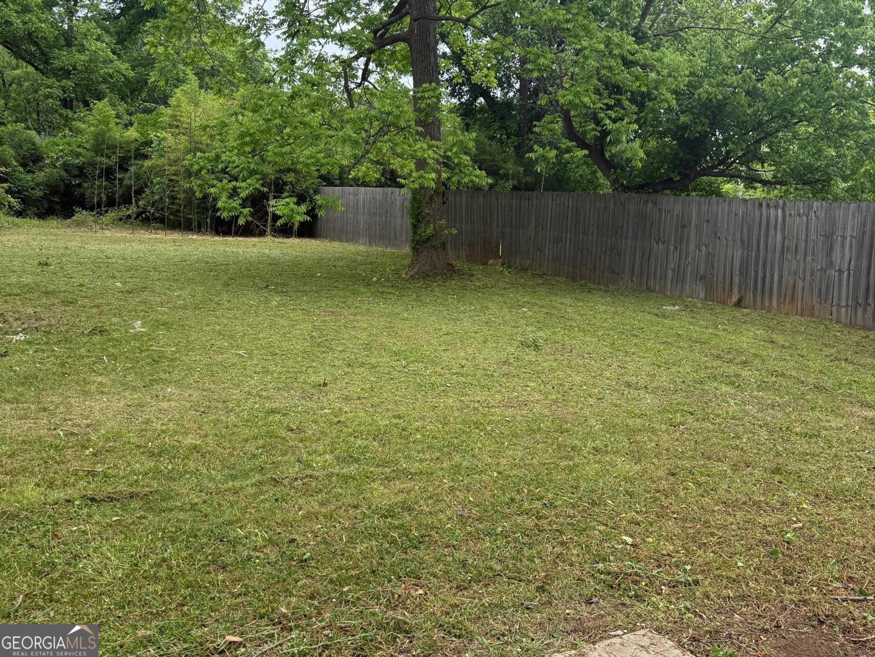 7055 Swift Street Lithonia, GA 30058 - Photo 9 of 9 a view of a backyard