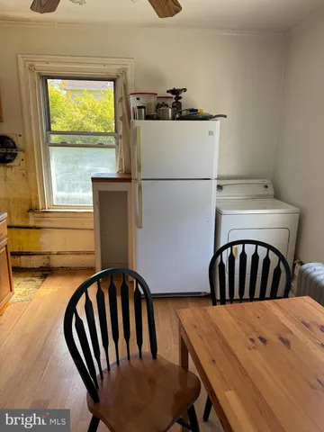 a view of kitchen and dining room