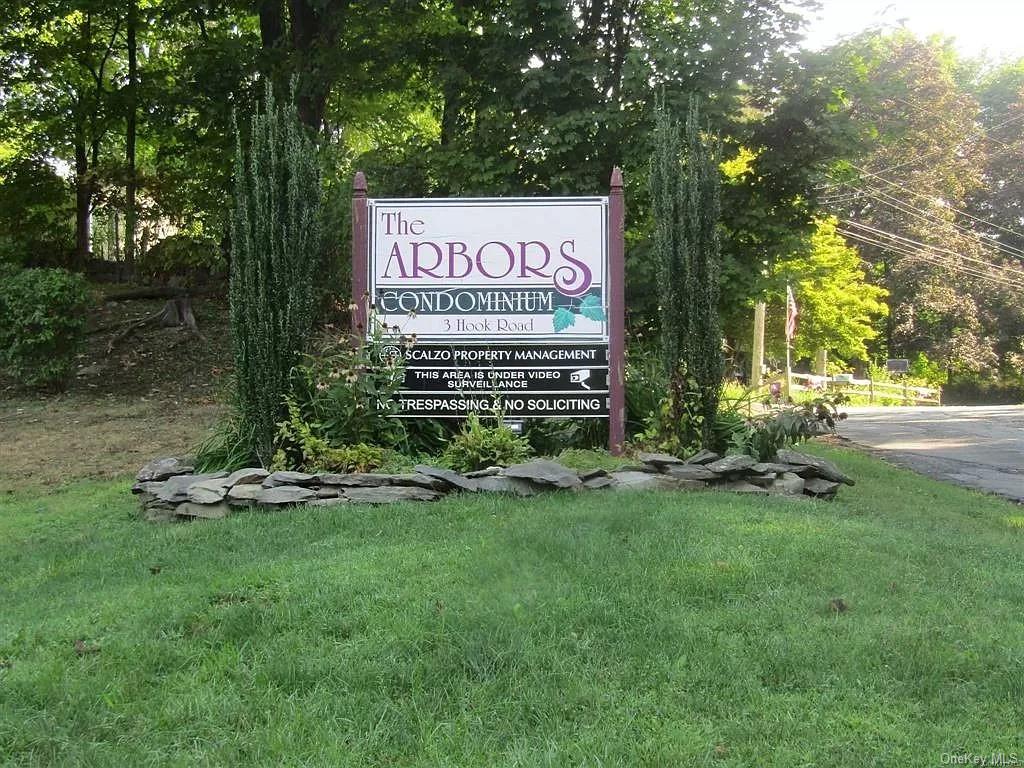 a view of a park that has sign board
