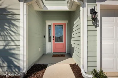 a front view of a house with a door