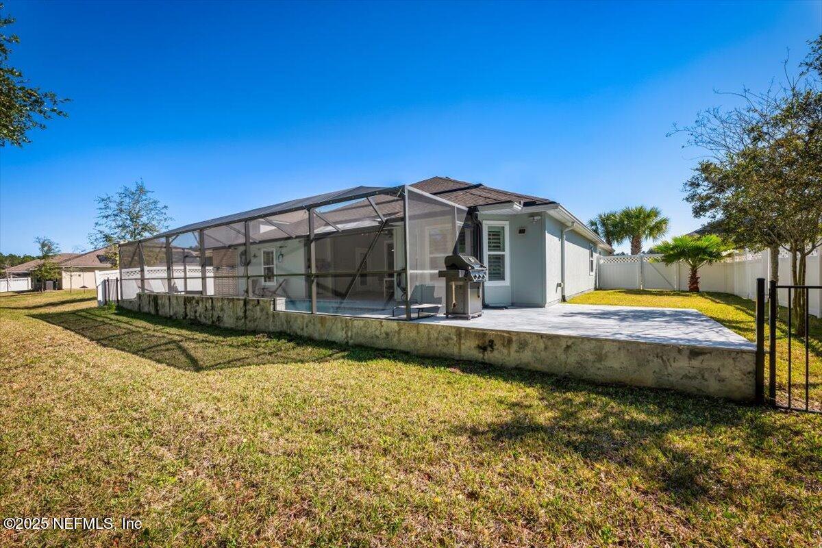 945 Rustlewood Lane St. Johns, FL 32259 - Photo 35 of 43 a view of a house with swimming pool