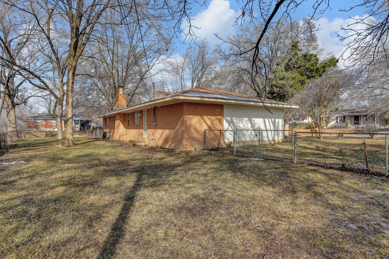 3121 Ruskin Road Bartlett, TN 38134 - Photo 25 of 25 a view of a house with a yard
