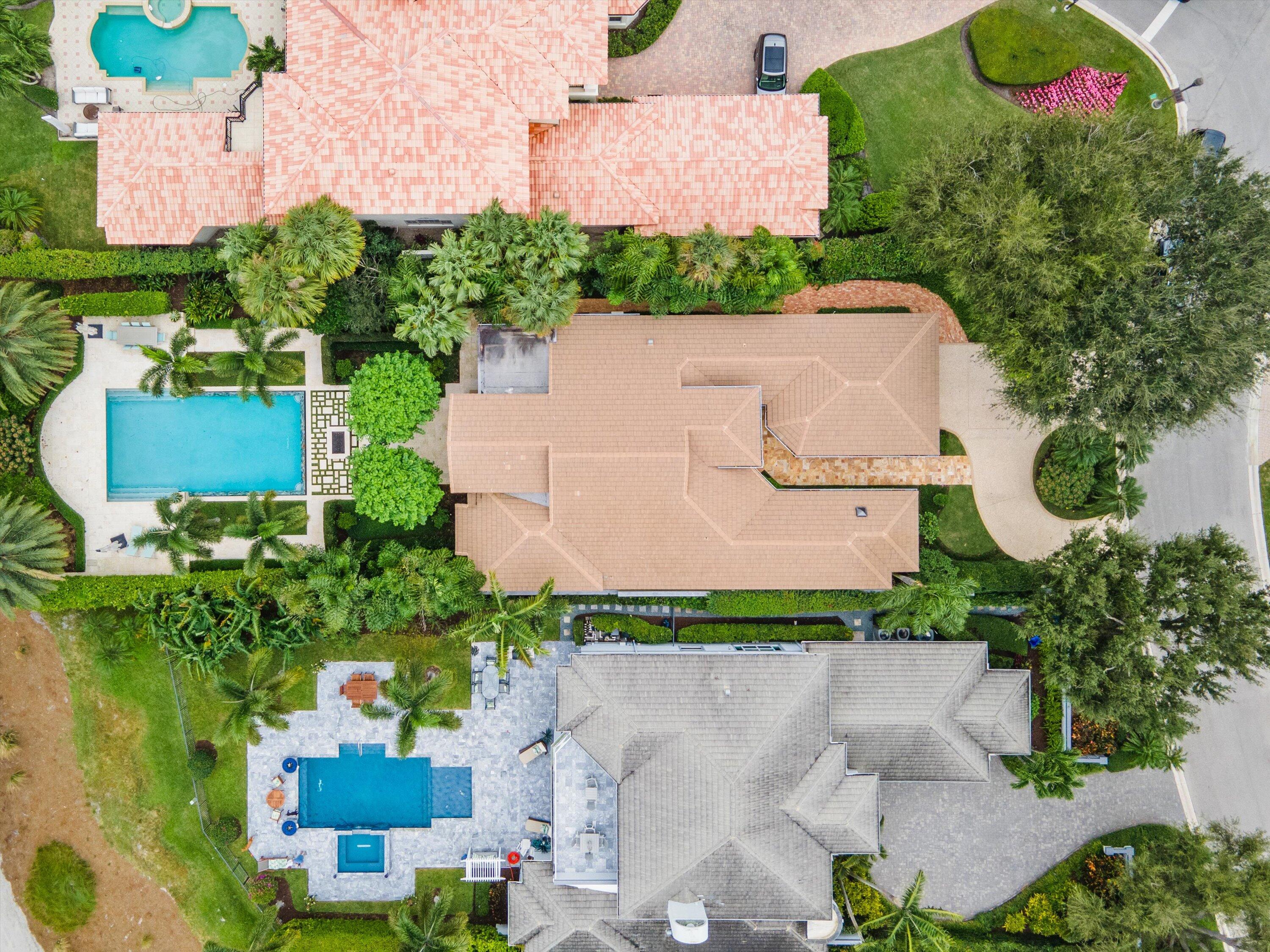 113 Echo Drive Jupiter, FL 33458 - Photo 15 of 15 an aerial view of a house with a garden and yard