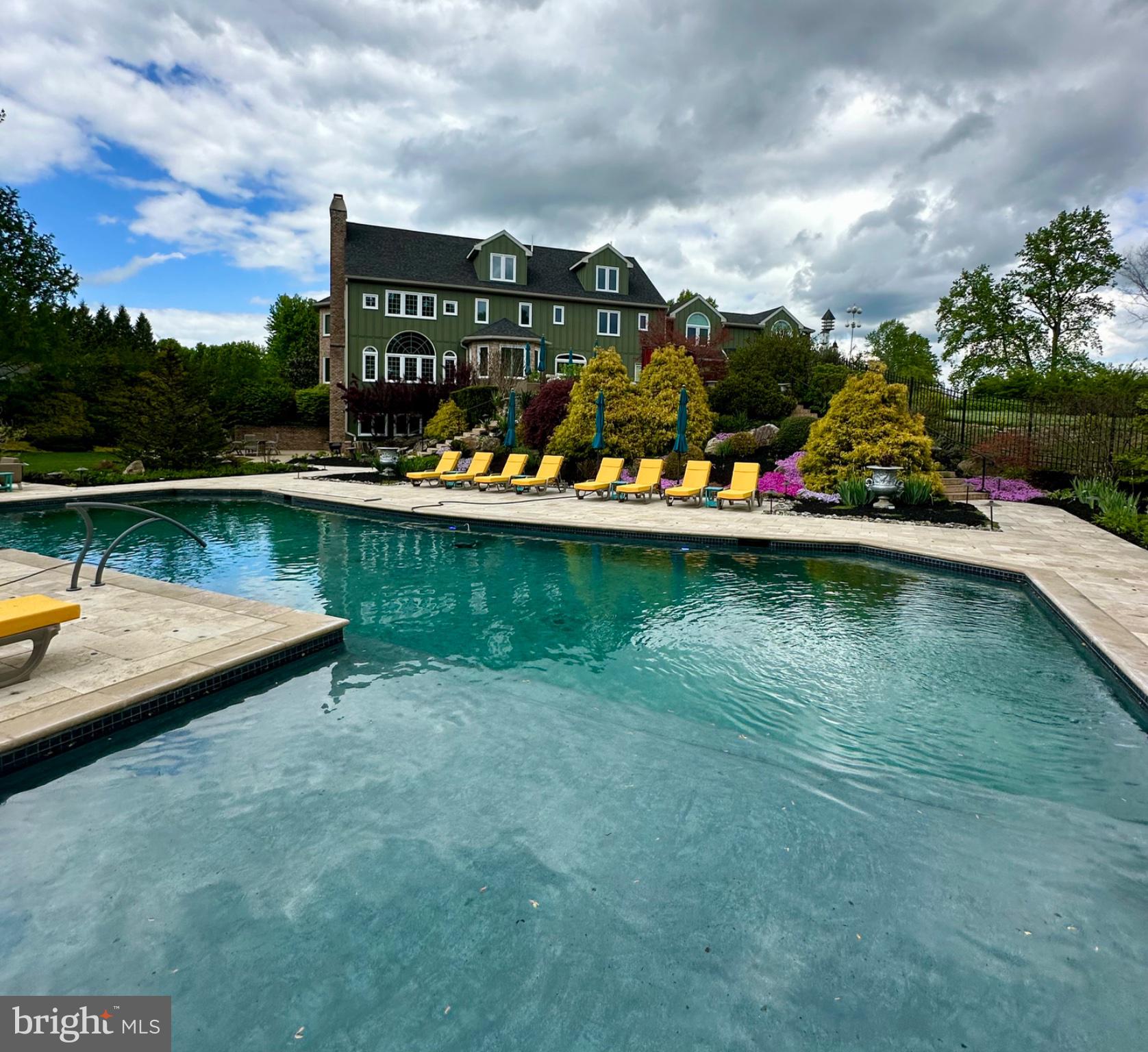 104 Indian Springs Road Kennett Square, PA 19348 - Photo 16 of 106 a view of swimming pool with a lake view