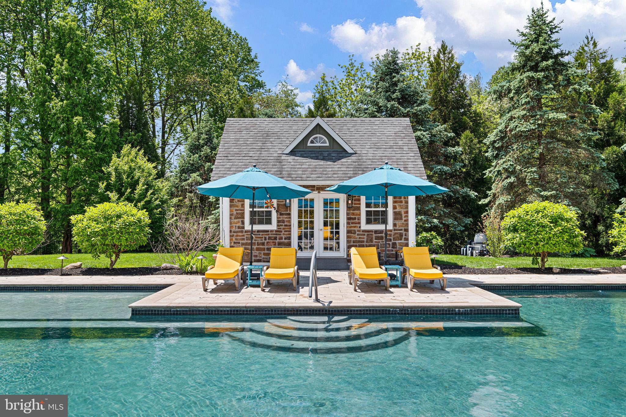 104 Indian Springs Road Kennett Square, PA 19348 - Photo 25 of 106 a view of a house with a yard patio and sitting area