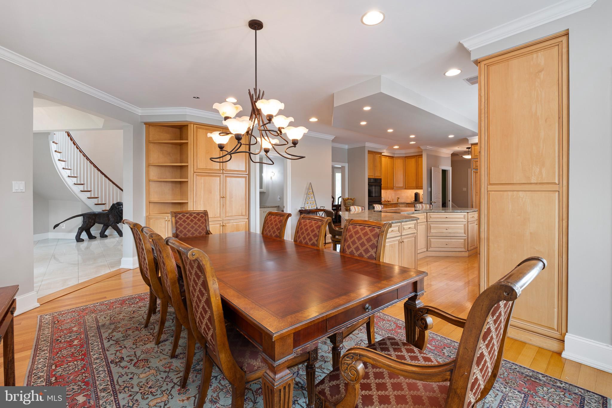 104 Indian Springs Road Kennett Square, PA 19348 - Photo 35 of 106 a view of a dining room with furniture and a chandelier